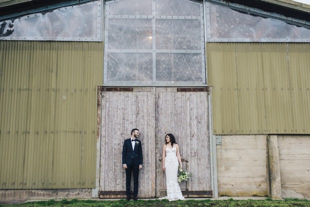 bride-and-groom-outside-barn
