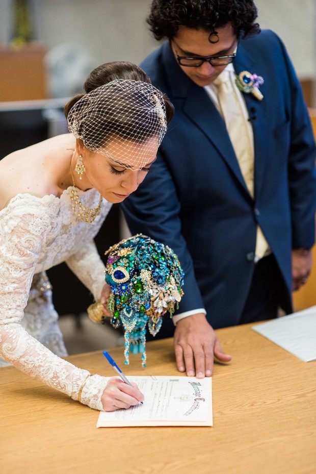 bride-and-groom-signing-the-register