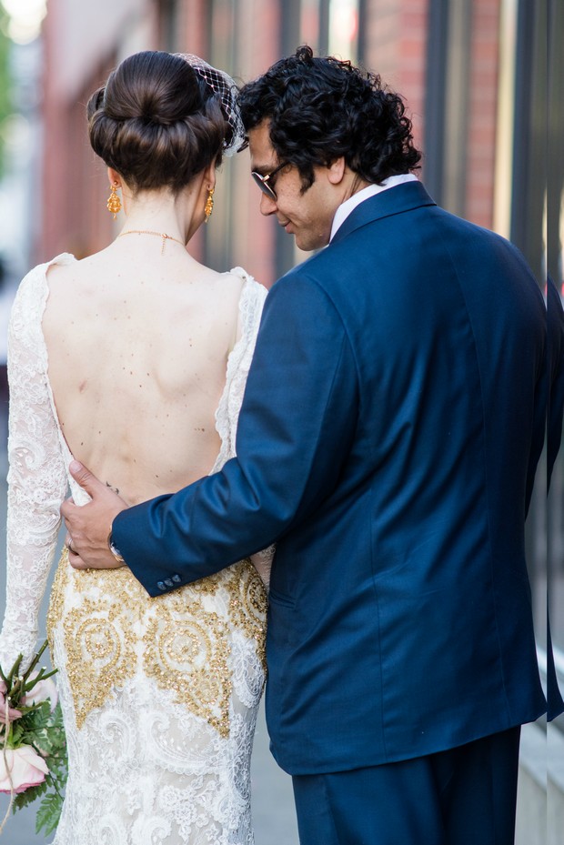 groom-with-arm-around-bride