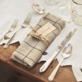 Place setting with plaid napkins